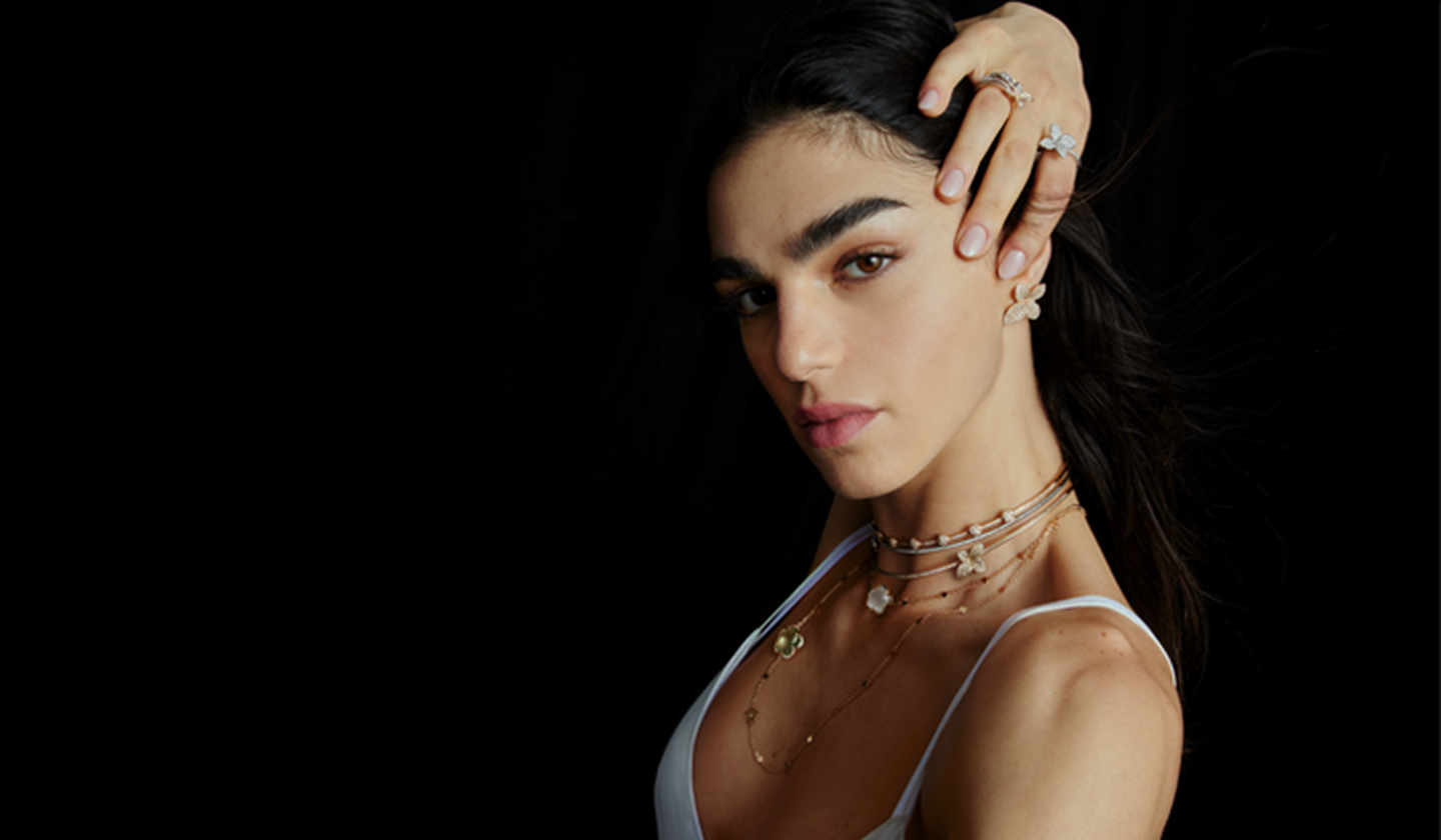 A woman wearing Pasquale Bruni jewellery.